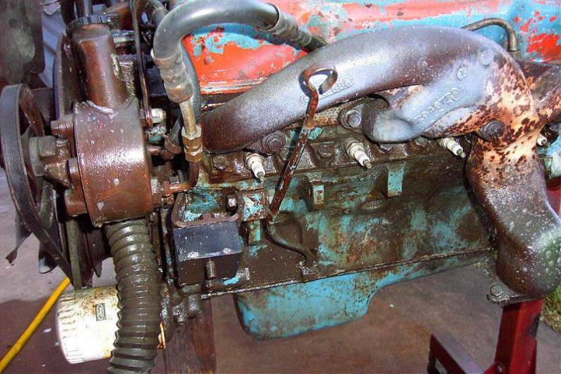 1968 dart 383 exhaust manifold  & motor mount.jpg