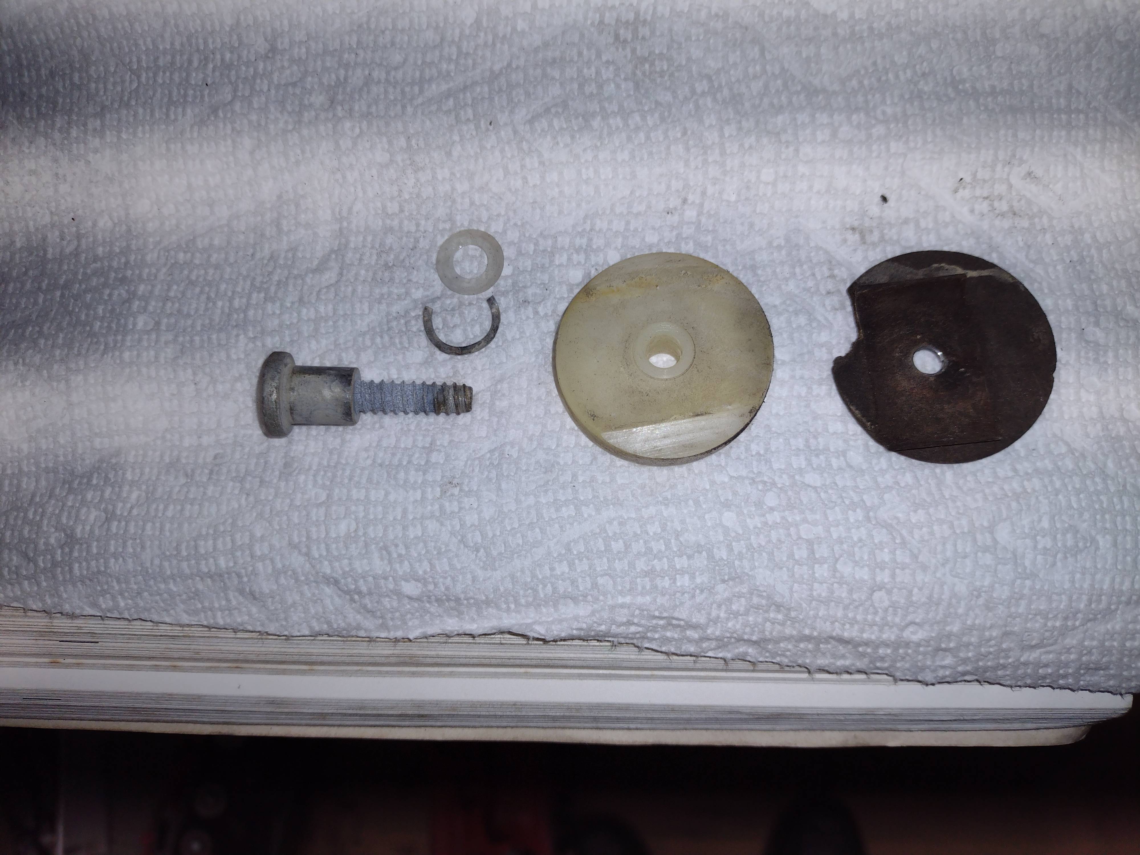 70-72 door window guide screw.jpg