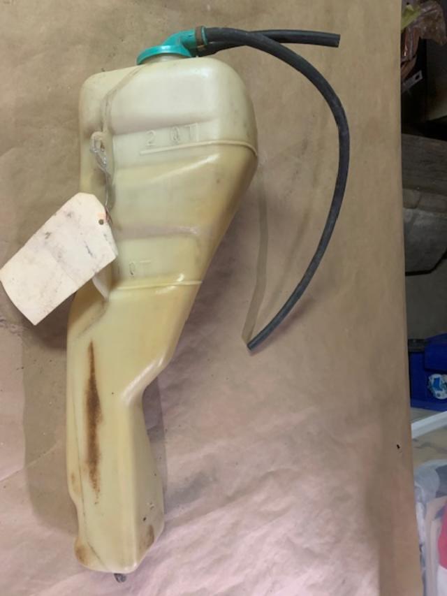 74 e body overflow bottle...jpg