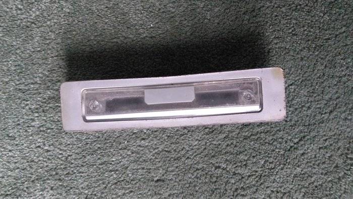cuda license plate lamp wo wire.jpg