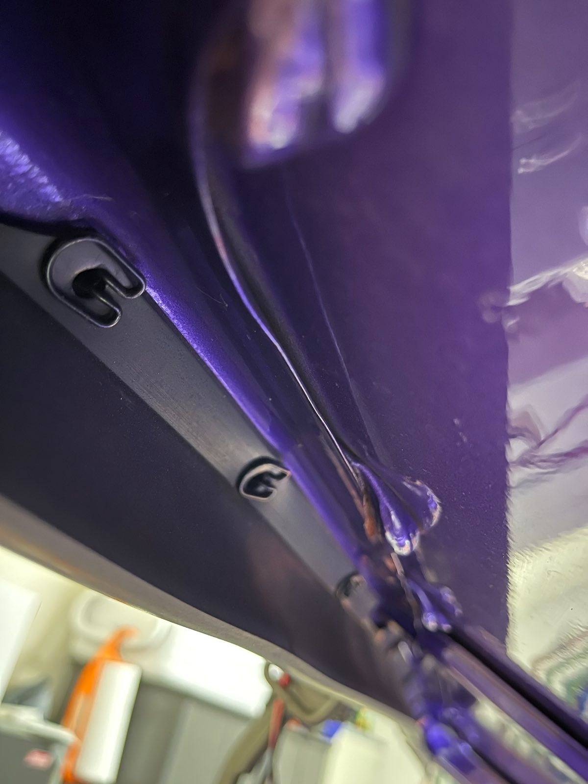 Driver side View of Center of Hood-to-Radiator Seal.jpg