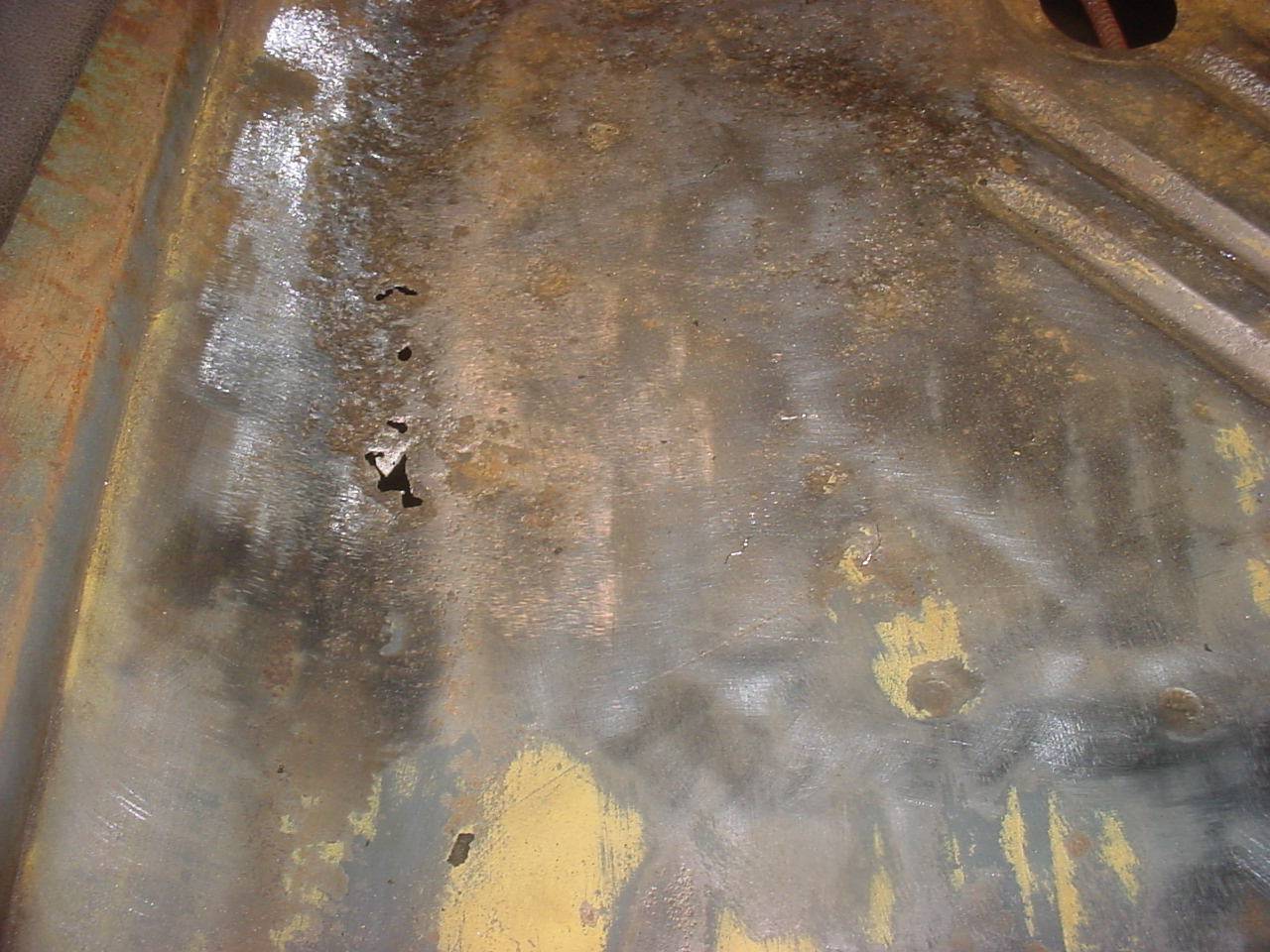 floor fr left damage 1.JPG