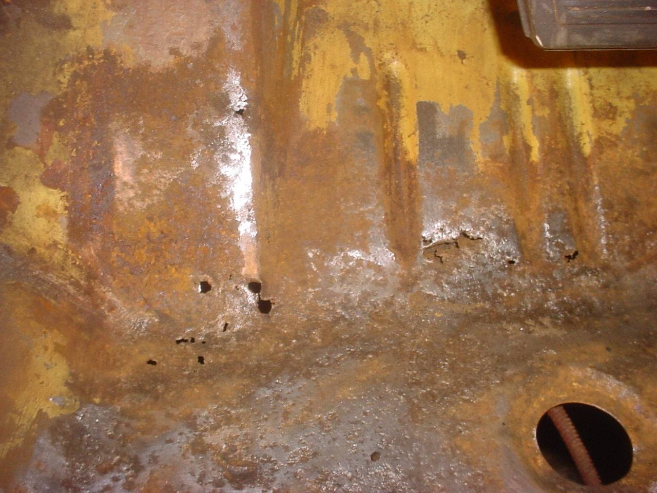 floor fr left damage closeup.JPG