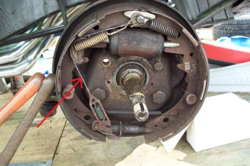 front drum brake with red arrow.jpg