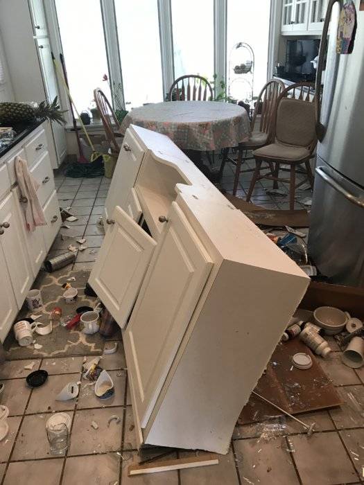 Kitchen cab on floor Easter 2919.JPG