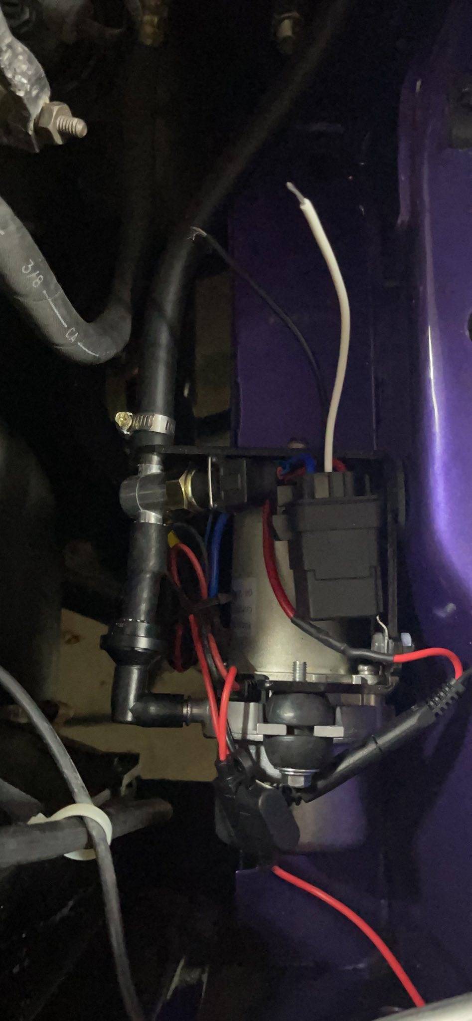 Leed Vacuum Pump Under Battery Tray.jpg