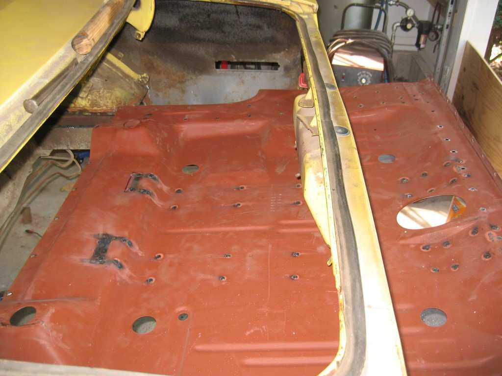One piece Trunk Floor Install - Rear Cross Member Removed and Sliding In Top View.jpg