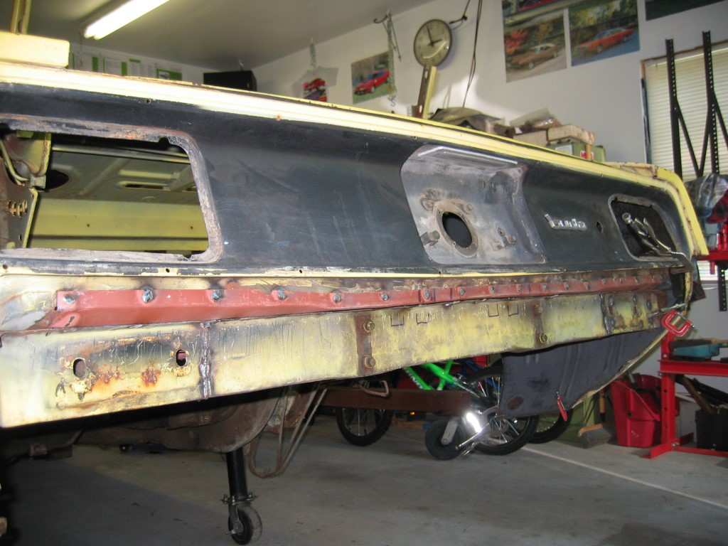 One piece Trunk Floor Install - welding trunk flange to tail light panel.jpg