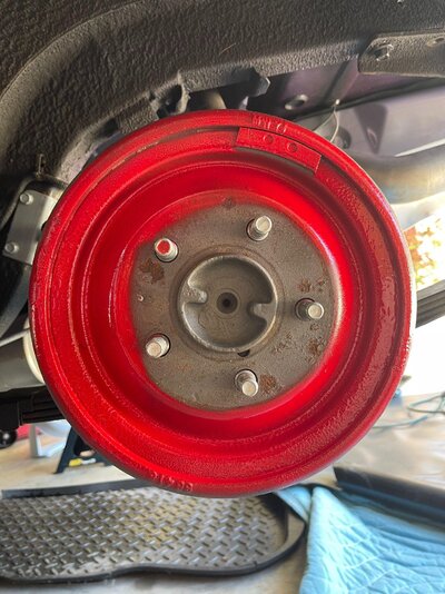Red Painted Rear Brake Drums Driver Side.jpg